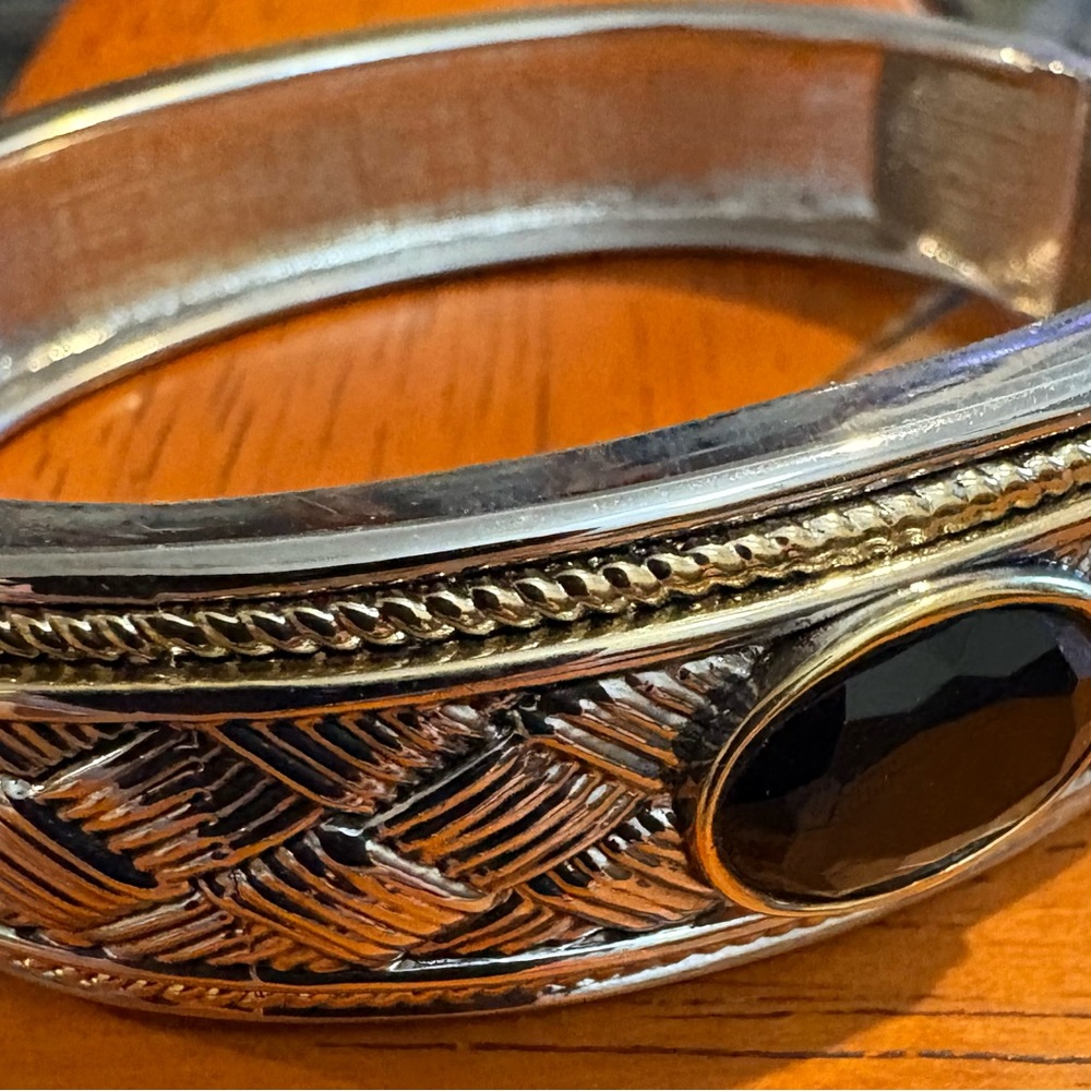 Intricate Silver and Gold Bracelet with Black Accent